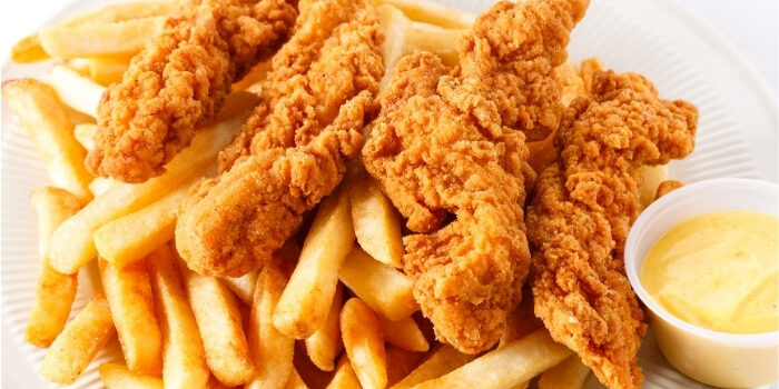 Crispy fried chicken tenders and golden fries, served at Fifth Avenue Taphouse New Brighton.