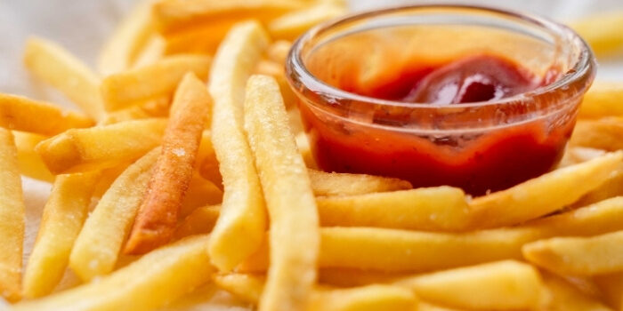 Crispy French fries with ketchup served at Fifth Avenue Taphouse New Brighton.