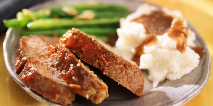 Slices of meatloaf, mashed potatoes, and green beans at Fifth Avenue Taphouse New Brighton.